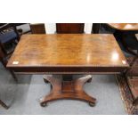 A good 19th century mahogany rectangular foldover card table on a carved column support with