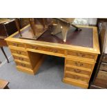 A large oak twin pedestal desk.