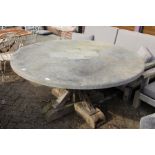 A good large heavy circular marble top table with substantial rustic oak base.