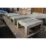 A set of four hardwood garden stools / occasional tables.