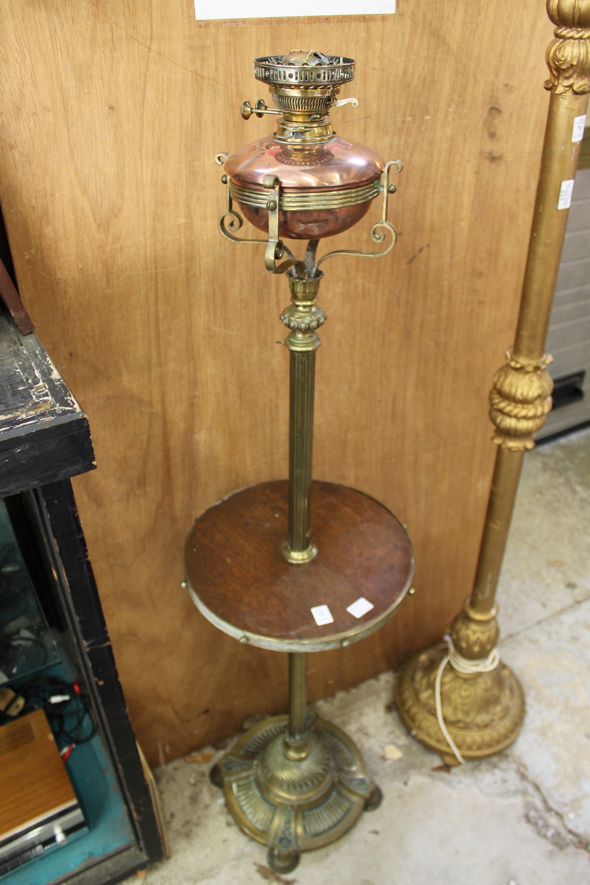 A brass and copper telescopic oil lamp / table.