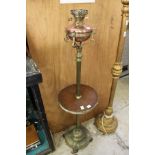 A brass and copper telescopic oil lamp / table.