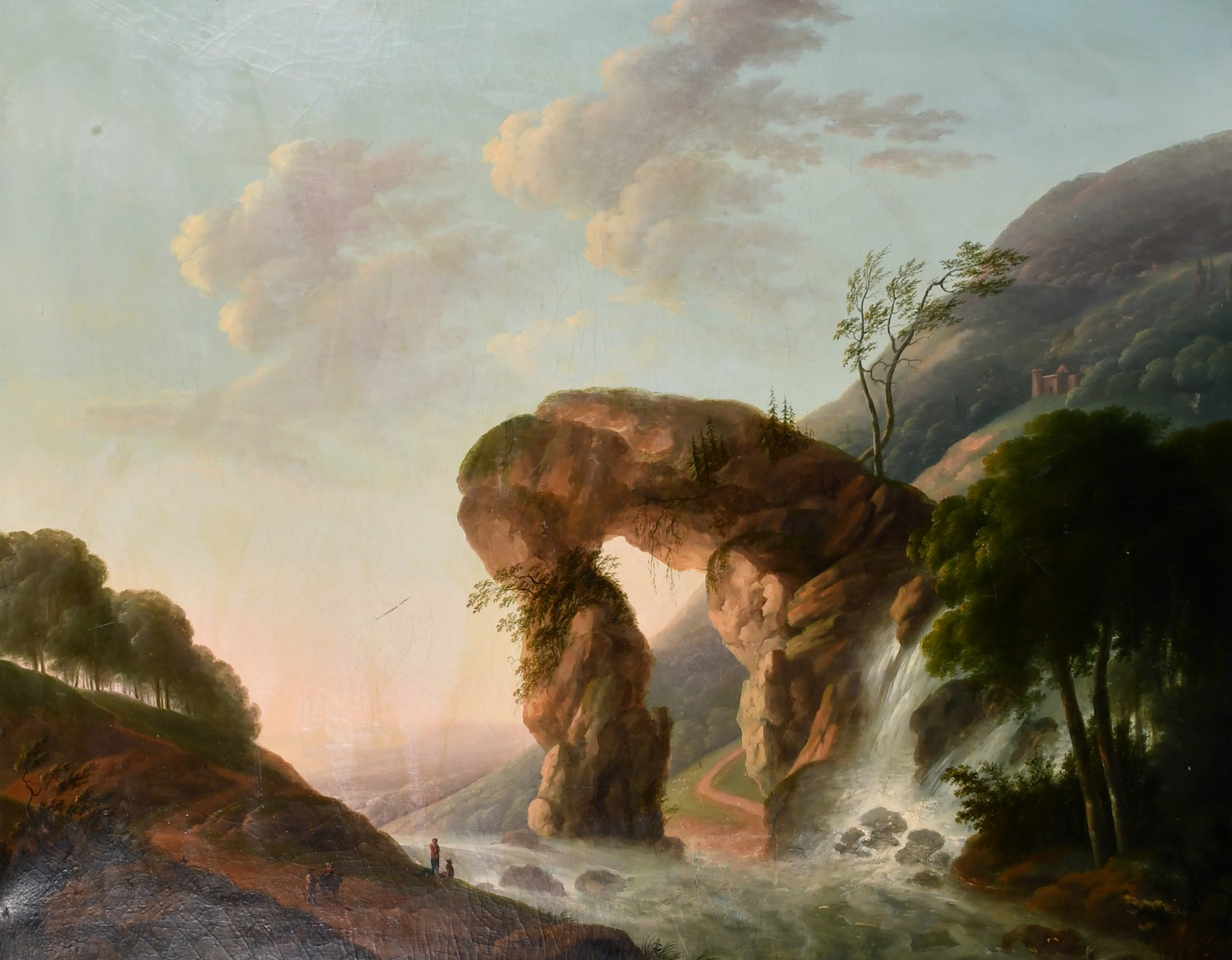 Early 19th century continental school, figures resting by a torrent with a waterfall and hillside