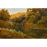 E. H. Thompson (1866-1949) British, A river meandering through a scenic wooded landscape,