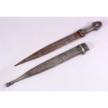 A 19TH CENTURY RUSSIAN KINJAL DAGGER with niello decoration to the scabbard and hilt, 49cm long.