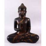 A FINE EARLY CARVED WOOD & LACQUER THAI BUDDHA, in a seated vitarka mudra pose, with traces of red