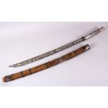 A FINE 19TH CENTURY BURMESE DHA SWORD with niello inlaid handle and fine silver inlaid blade, with