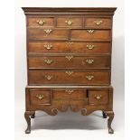 AN 18TH CENTURY CHEST ON STAND with mould cornice, three frieze drawers over two short and two long,