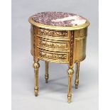 A FRENCH STYLE GILT WOOD THREE DRAWER OVAL CHEST, with red marble inset top.