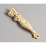 A CARVED BONE NUDE, 4 ins long