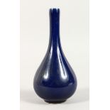 A SMALL CHINESE BLUE BOTTLE VASE Blue mark, 6 ins high