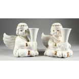 A PAIR OF GILDED ANGEL SPILL VASES, 6 in. high.