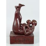 A MODERN BRONZE MOTHER AND CHILD on a rectangular base. 12 ins high.