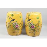 A PAIR OF CHINESE YELLOW BARREL SEATS with birch and flowers 17 ins high