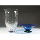 A PLAIN GLASS VASE 13 ins. high and A BLUE GLASS DISH 11 ins. diameter.