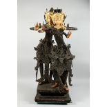 A THAI GROUP OF TWO DANCING FIGURES MODELLED FROM HUNDREDS OF COINS, 3 ft. 6 in. high