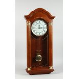 A WESTMINSTER CHIME, LONDON CLOCK CO. HANGING CLOCK, 2 ft. 3 in. high.