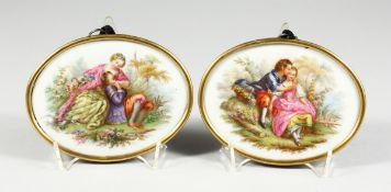 A GOOD PAIR OF 19TH CENTURY CONTINENTAL PORCELAIN OVALS of young lovers in a gilt metal frame, 4