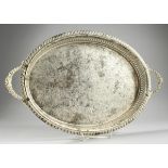 A TWO HANDLED OVAL PLATED TRAY, 1 ft. 2 in. long.