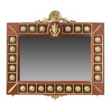 A MIRROR IN THE LOUIS XVI STYLE, INSET WITH PORCELAIN PANELS AND GILT DECORATION. 3 ft. 6 in.