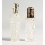 TWO SILVER TOP CUT GLASS SCENT BOTTLES