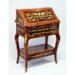 A FRENCH STYLE ROSEWOOD AND MARQUETRY BUREAU with drawers to the interior, two long drawers on