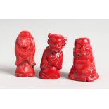 THREE SMALL CARVED CORAL FIGURES OF MEN 1.5 ins high.