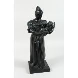 A POTTERY BRONZED MOTHER AND CHILD 19 ins. high.