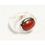 A GOOD CRYSTAL AND CORAL DRESSING RING