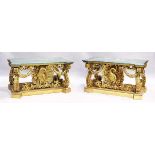 A SUPERB PAIR OF EARLY GEORGIAN, WILLIALM KENT DESIGN, MARBLE TOP AND GILDED CONSOLE TABLES. The