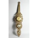 A FOUR DIAL CLOCK BAROMETER in a gilded frame, 31.5 ins long