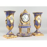 AN ITALIAN THREE PIECE CLOCK GARNITURE comprising blue and gilded clock, painted with flowers, 19
