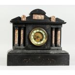 A VICTORIAN MARBLE MANTLE CLOCK with column supports, 13 in. high.