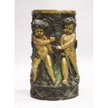 A GOOD TWO COLOUR BRONZE CIRCULAR STAND with Bacchanalian cherubs, square marble top, 2 ft. 6 in.