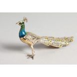 A SILVER AND ENAMEL PEACOCK. 15.5cm long. (AF)