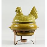 A POTTERY HEN TUREEN AND COVER on a metal stand, 13 ins high.