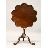 A GOOD GEORGE III MAHOGANY TILT TOP TRIPOD TABLE, with a lobed, dished top, plain turned column