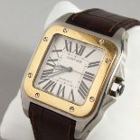 A GOOD CARTIER SANTOS LIMITED EDITION WRISTWATCH with leather strap, No. 582436CW, in a red box.