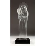 A LARGE LALIQUE CRYSTAL MADONNA AND CHILD, CIRCA 1950 on a black base. Signed, 13.5 ins high