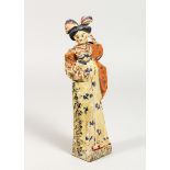 A CARVED WOOD GEISHA 10 ins high.