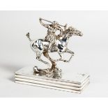 A POLO TROPHY, A PLATED HORSE AND RIDER (car mascot) on an octagonal base, 6 ins long.
