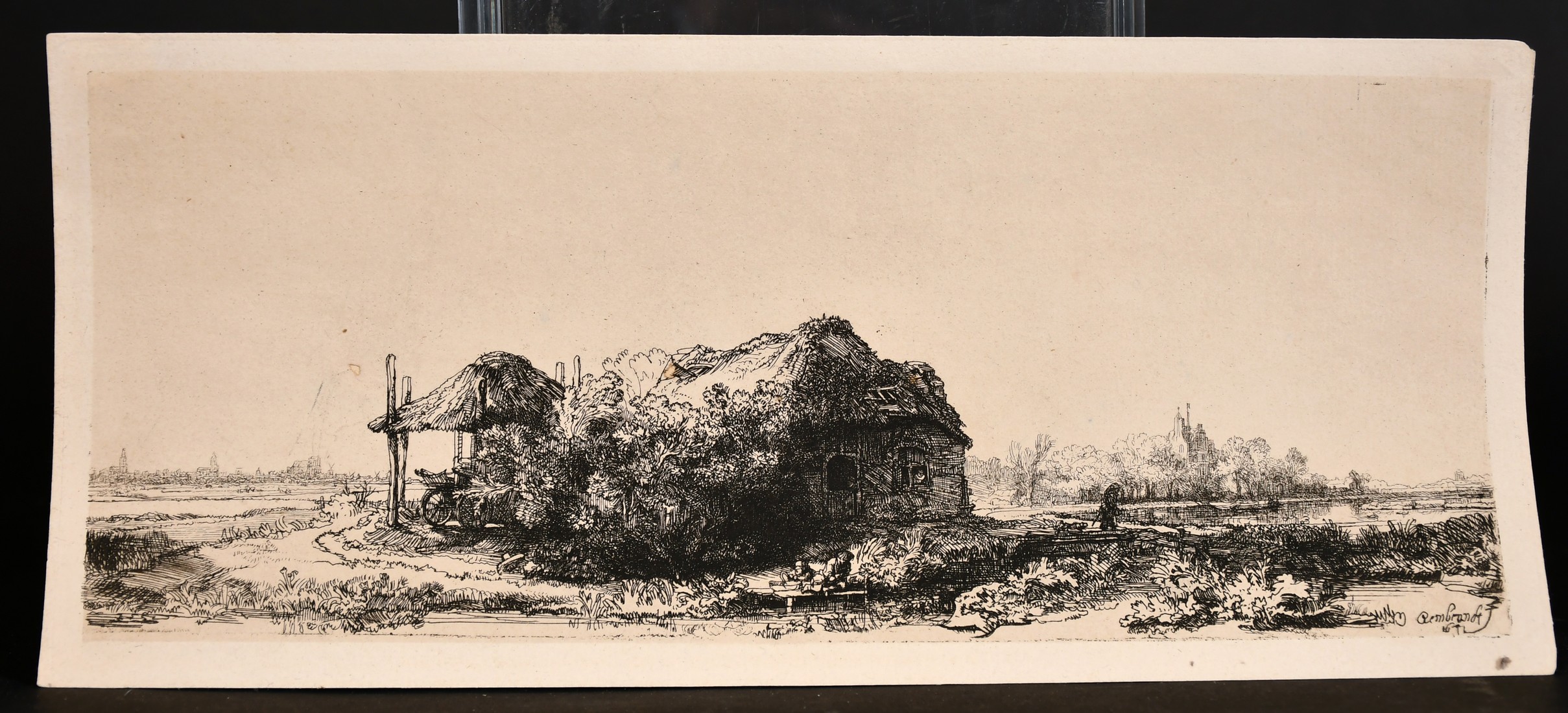 After Rembrandt, An engraving of a young boy fishing by a cottage, 6" x 13", (unframed). - Image 2 of 3