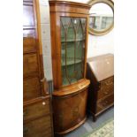 A good reproduction satinwood standing corner display cabinet.