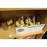 A good collection of Royal Doulton Winnie the Pooh porcelain ornaments and related items.