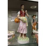 A large Royal Dux figure of a young lady gathering fruit in her apron.