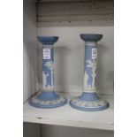 A pair of pale blue Jasperware candlesticks.