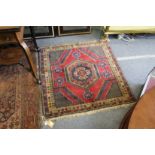 A small Persian rug.