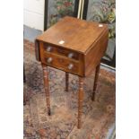 A 19th century mahogany two drawer drop flap work table.