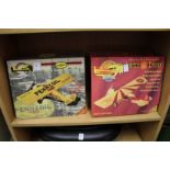 Two cast metal models of aeroplanes, boxed.