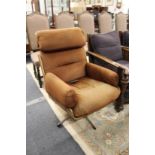 A Charles Eames style swivel armchair.